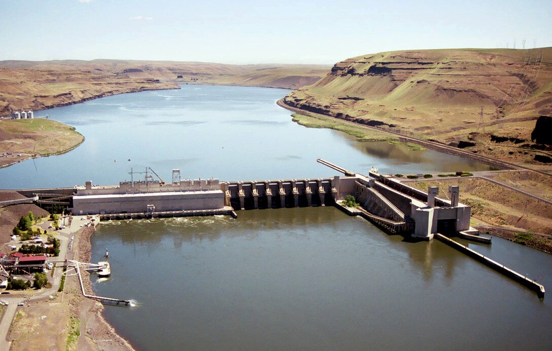 This congressionally authorized project includes Lower Monumental Dam, powerhouse, navigation lock, two fish ladders, a juvenile fish facility (JFF), and appurtenant facilities providing for navigation, hydroelectric generation, recreation, and irrigation. The dam is located at the head of Lake Sacajawea, the reservoir created by Lower Monumental Dam. It is 3,791 feet long, with an effective height of about 100 feet. The dam is a concrete gravity-type dam, with earthfill abutment embankments.