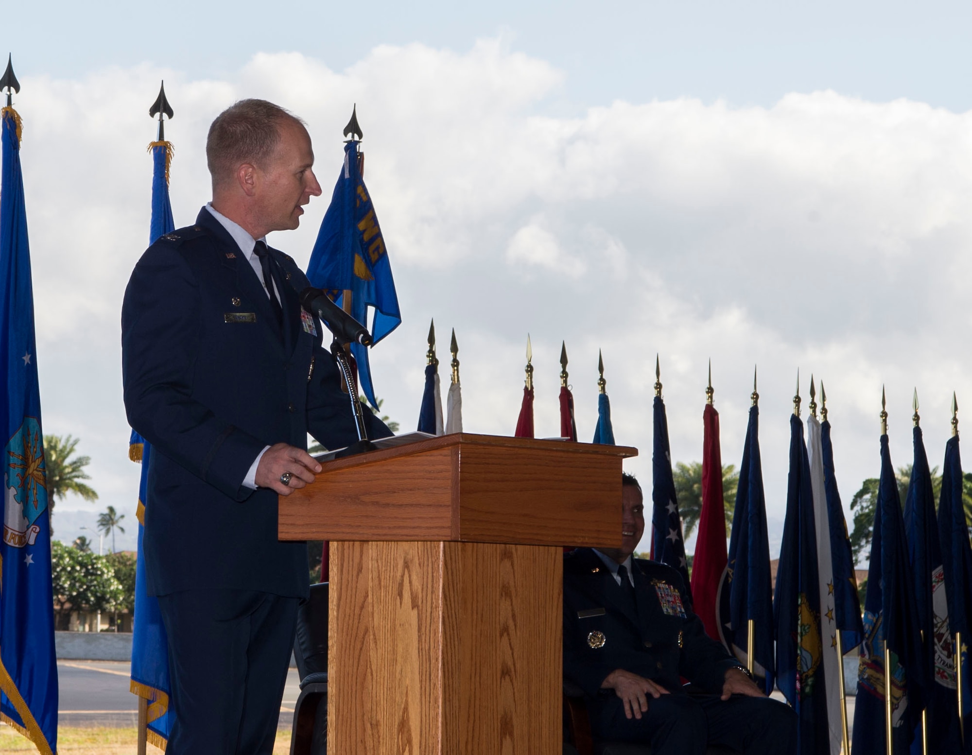 Col. Halsey Burks, 15th Wing commander, gives the opening comments during the 15th Operations Group Assumption of Command Ceremony, at Joint Base Pearl Harbor-Hickam, Hawaii, June 18, 2019. Over the past year, the 15th Operations Group organized and transported the return of 55 sets of remains, marking the first Honorable Carry Mission from North Korea. (U.S. Air Force photo by Tech. Sgt. Heather Redman)