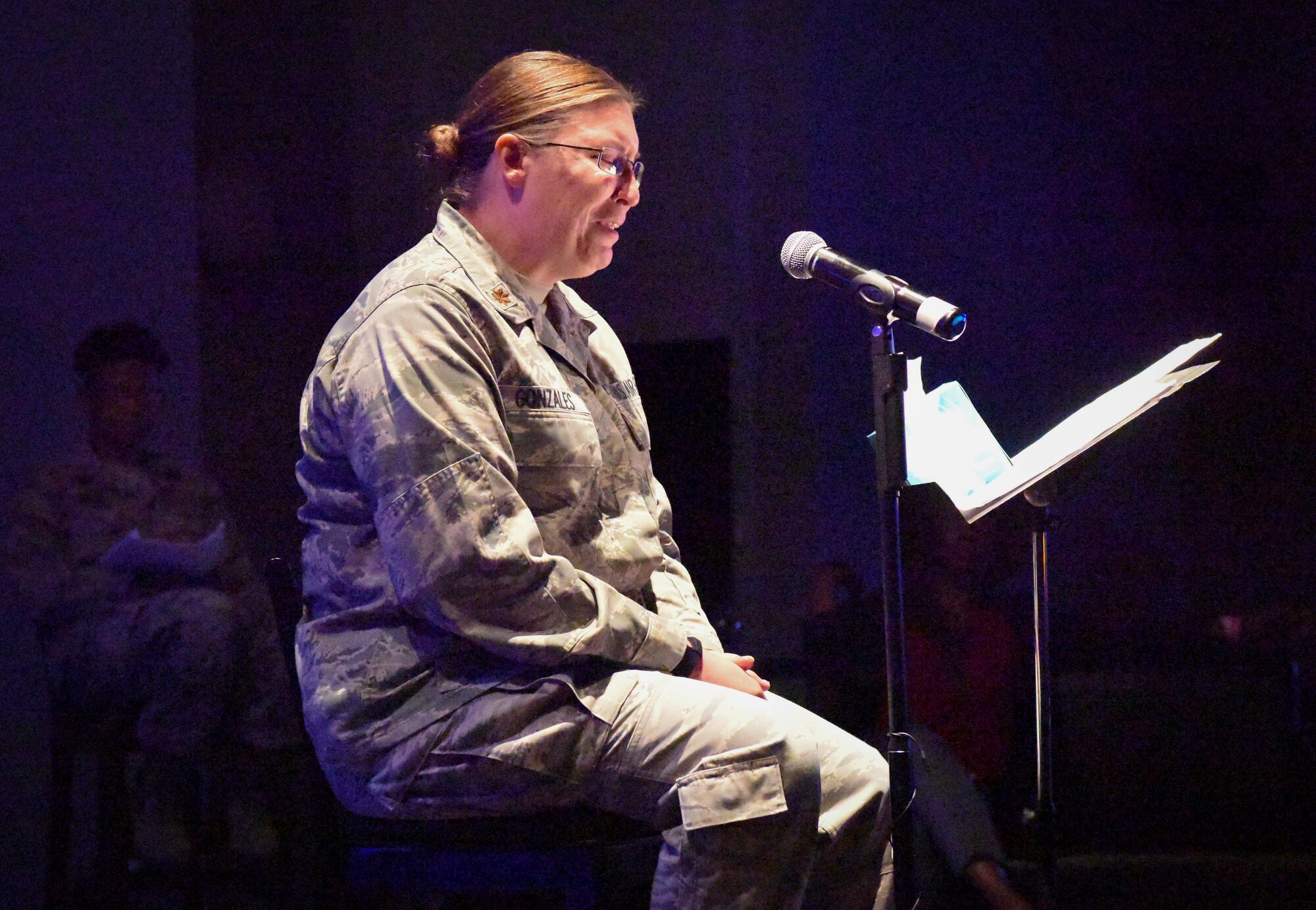 U.S. Air Force Maj. Lisa Gonzales, 86th Medical Group nurse midwife, explains her battle and victory over a brain tumor during a Storytellers event on Ramstein Air Base, Germany, June 20, 2019. Gonzales faced the challenge of relearning her cognitive skills under the constant pressure to retire and stay home, yet her determination fueled her recovery.