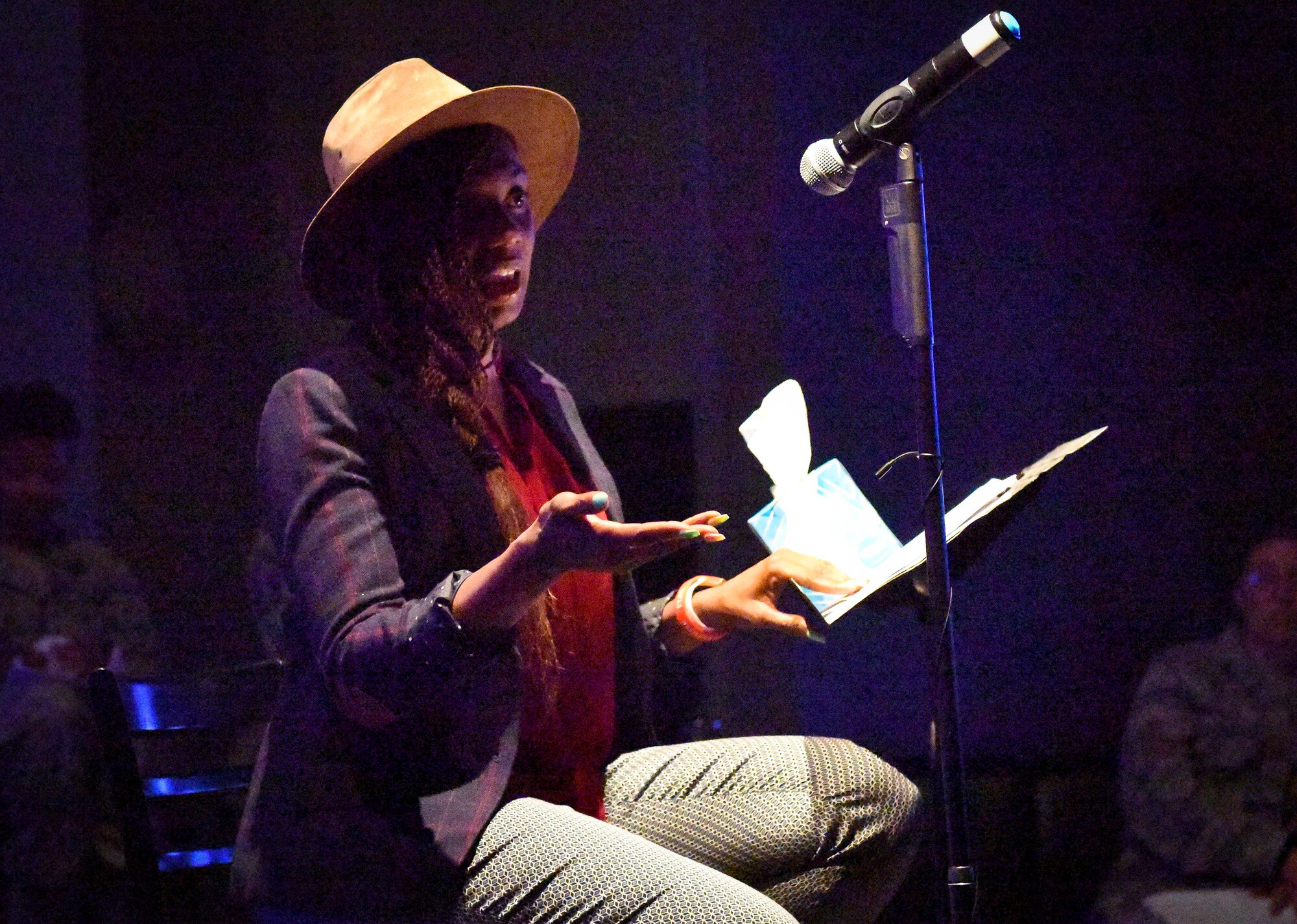 U.S. Air Force Tech. Sgt. April Hamilton, 86th Logistics Readiness Squadron assistant noncommissioned officer in charge of Heavy Parts Store, explains to a Storytellers audience how she overcame mental, emotional, and physical health issues on Ramstein Air Base, Germany, June 20, 2019. Hamilton shared her story to urge others to keep fighting and get help like she did.