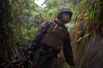 U.S. Marine Corps Cpl. Abimael Reyes-Aguilar navigates through an endurance course during a Marine Corps Martial Arts Program Instructor Course at Camp Hansen, Okinawa, Japan, June 20, 2019. Reyes-Aguilar a food service specialist with Food Service Company, Combat Logistics Regiment 37, 3rd Marine Logistics Group, participated in the instructor course in order to become a MCMAP force multiplier. Reyes-Aguilar is a native of Gardena, California. (U.S. Marine Corps photo by Lance Cpl. Isaiah Campbell)