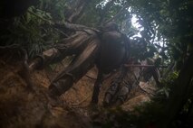 U.S. Marines participate in the culminating event during a Marine Corps Martial Arts Program Instructor Course at Camp Hansen, Okinawa, Japan, June 20, 2019. For the culminating event the Marines ran an endurance course in order to push their bodies beyond their anticipated physical limits. (U.S. Marine Corps photo by Lance Cpl. Isaiah Campbell)