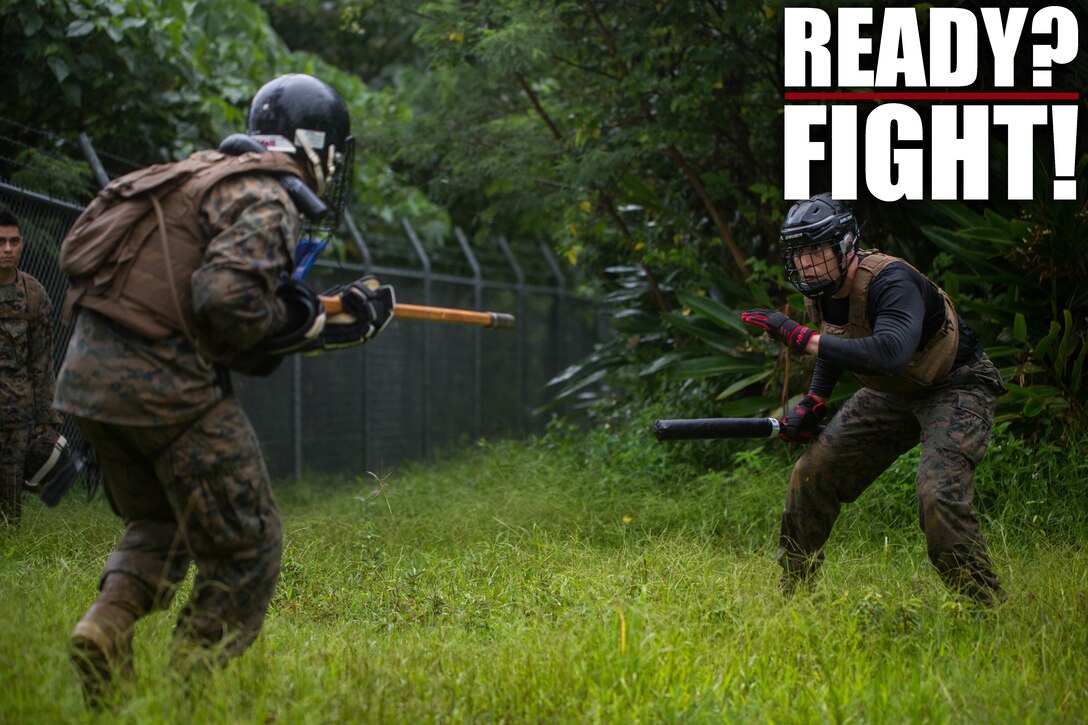 U.S. Marines participate in the culminating event during a Marine Corps Martial Arts Program Instructor Course at Camp Hansen, Okinawa, Japan, June 20, 2019. For the culminating event the Marines ran an endurance course, as well as conducted several stand-up and ground fighting scenarios in order to push their bodies beyond their anticipated physical limits. (U.S. Marine Corps photo by Lance Cpl. Isaiah Campbell)