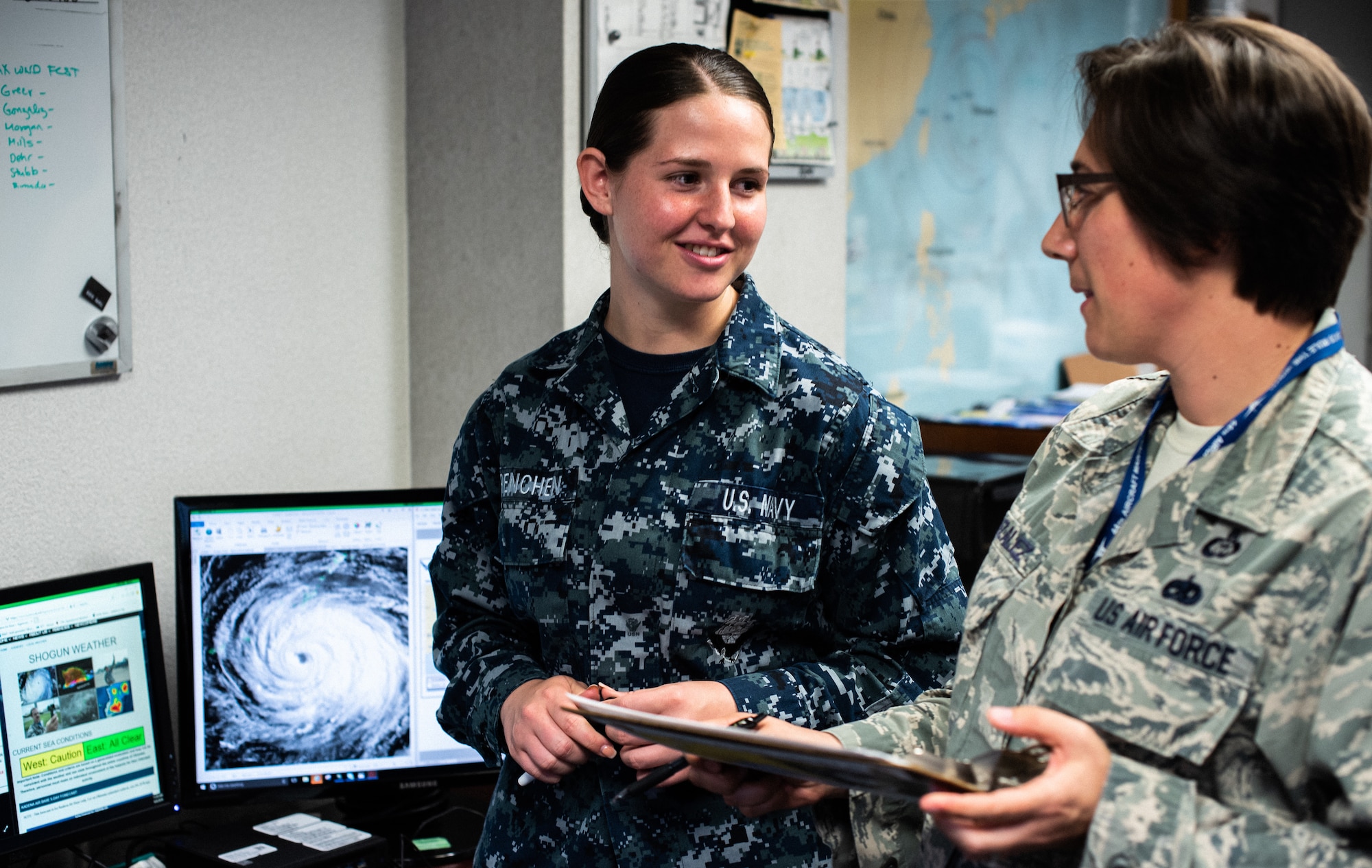 U.S. Air Force Master Sgt. Leah Gonzalez, 18th Operations Support Squadron NCO in charge of airfield support, and U.S. Naval Airman Amber Renchen, an apprentice weather forecaster with the Navy Oceanography and Anti-Submarine Warfare Detachment, share insight.