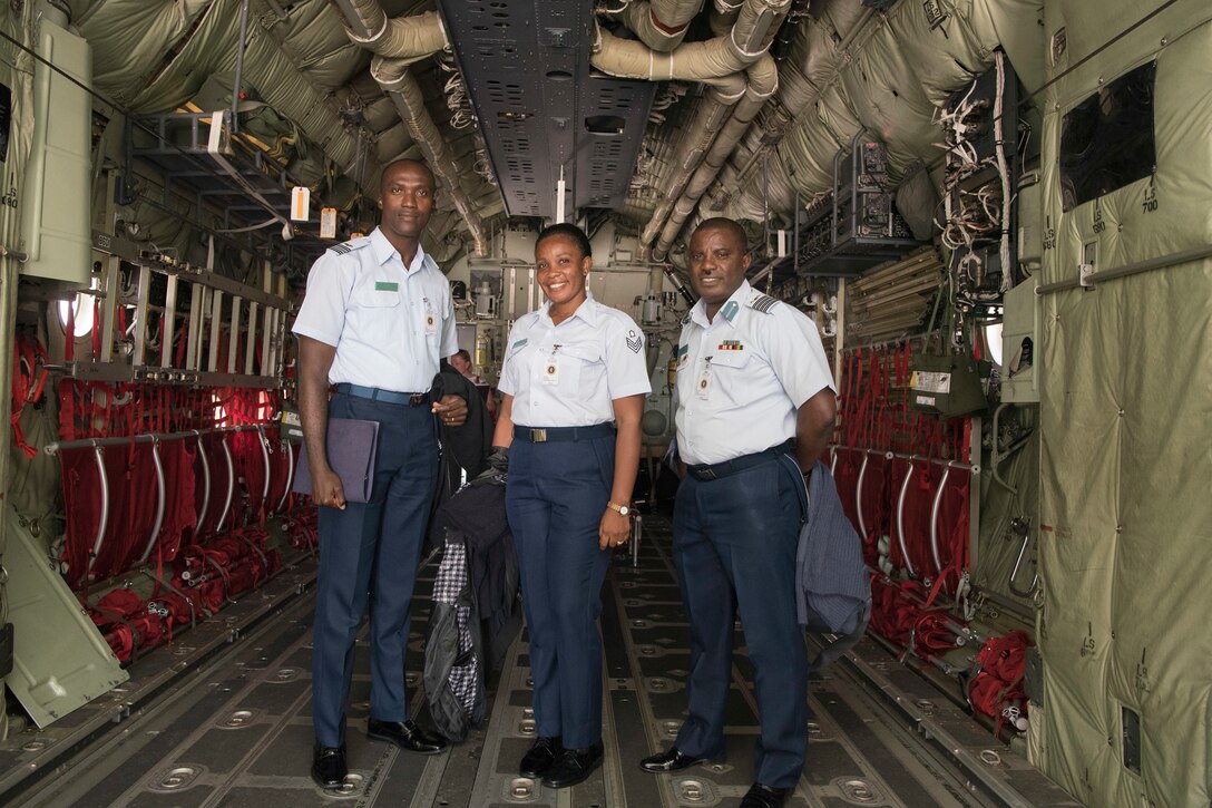 Ghana air force delegates pose for a photo inside a C-130J Super Hercules during the African-European Partnership Flight on Ramstein Air Base, Germany, June 17 - 21, 2019. This multilateral military-to-military security cooperation event is intended to strengthen U.S. strategic partnerships with key countries in Europe and Africa. (U.S. Air Force photo by Senior Airman Kristof J. Rixmann)