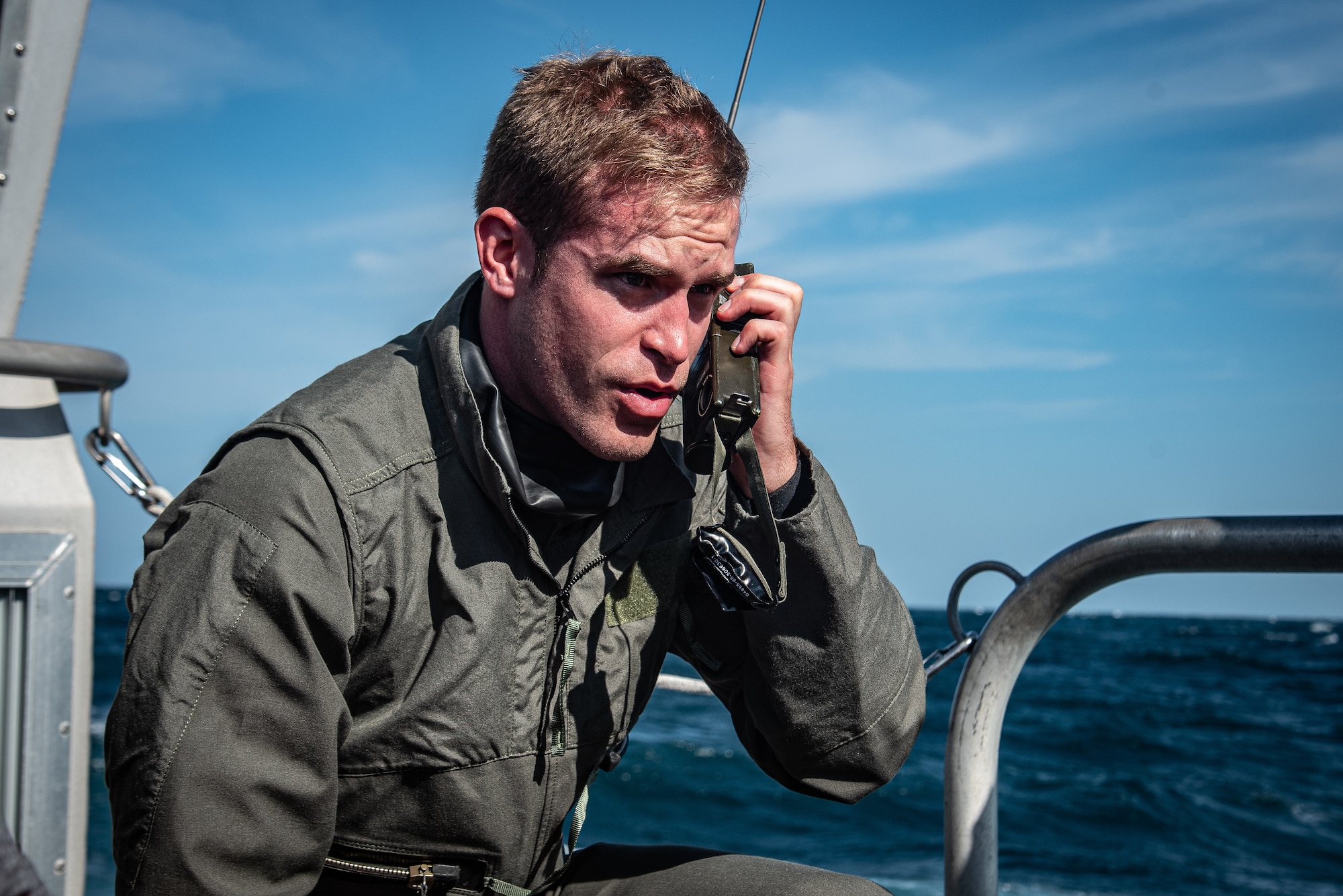 U.S. Air Force Capt. Kyle Rasmussen, 55th Fighter Squadron pilot, makes a mayday call during a search-and-recovery exercise off the coast of Tybee Island Coast Guard Station, Georgia, June 21. 2019.