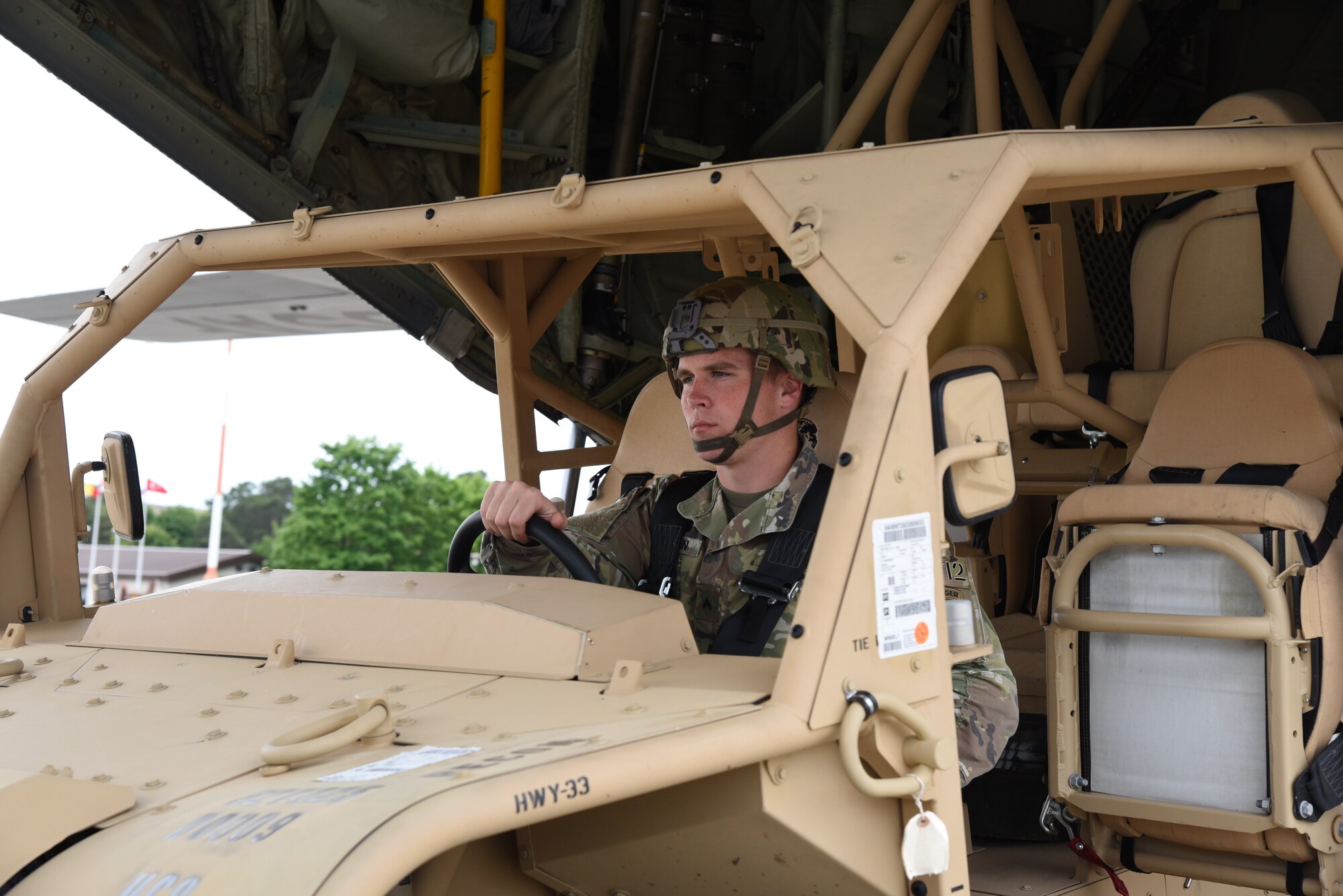 Army Corporal Jared Guden, 82nd Airborne, scout platoon team leader, drives a ground mobility vehicle, off of a C-130J following the signals of the 815th loadmasters during preparations for exercise Swift Response 19, June 14, 2019. The exercise is one of the premier military crisis response training events featuring high readiness airborne forces from eight NATO nations. Activities include intermediate staging base operations, multiple airborne operations, and several air assault operations. The Swift Response exercises have had great success in creating a foundation for the strong relationships we share with several European allies and partners today. (U.S. Air Force photo by Master Sgt. Jessica Kendziorek)