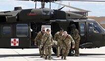 100th Missile Defense Brigade (GMD) Soldiers participate in a Situational Training Exercise at the Butts Army Airfield, Fort Carson, Colorado, June 12, 2019. The Soldiers conducted squad level movement, maneuver and assault operations using simulated rounds, aided by the 2-135th General Support Aviation Battalion of the Colorado Army National Guard, who provided one UH-60 Black Hawk helicopter for airlift and medevac training and operations. (U.S. Army National Guard photo by Staff Sgt. Zachary Sheely)