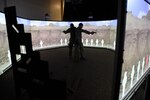 Members of the North Carolina and Louisiana Air National Guard (ANG) conduct use of force and tactical situational practice in a Firearms Training Simulator June 12, 2019, at the 176th Security Forces Squadron in Anchorage, Alaska. The 145th Security Forces and 263rd Combat Communications Squadrons with the NCANG, and the 159th Security Forces Squadron with the LANG travel to Joint Base Elmendorf-Richardson to train on various tactical and strategic law enforcement procedures during annual training.