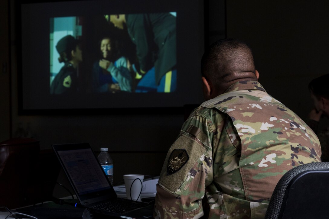 U.S. Army Reserve Soldiers with the 335th Signal Command (Theater) watch a video during a Casualty Notification and Assistance Course at the headquarters in East Point, Georgia, June 11, 2019.