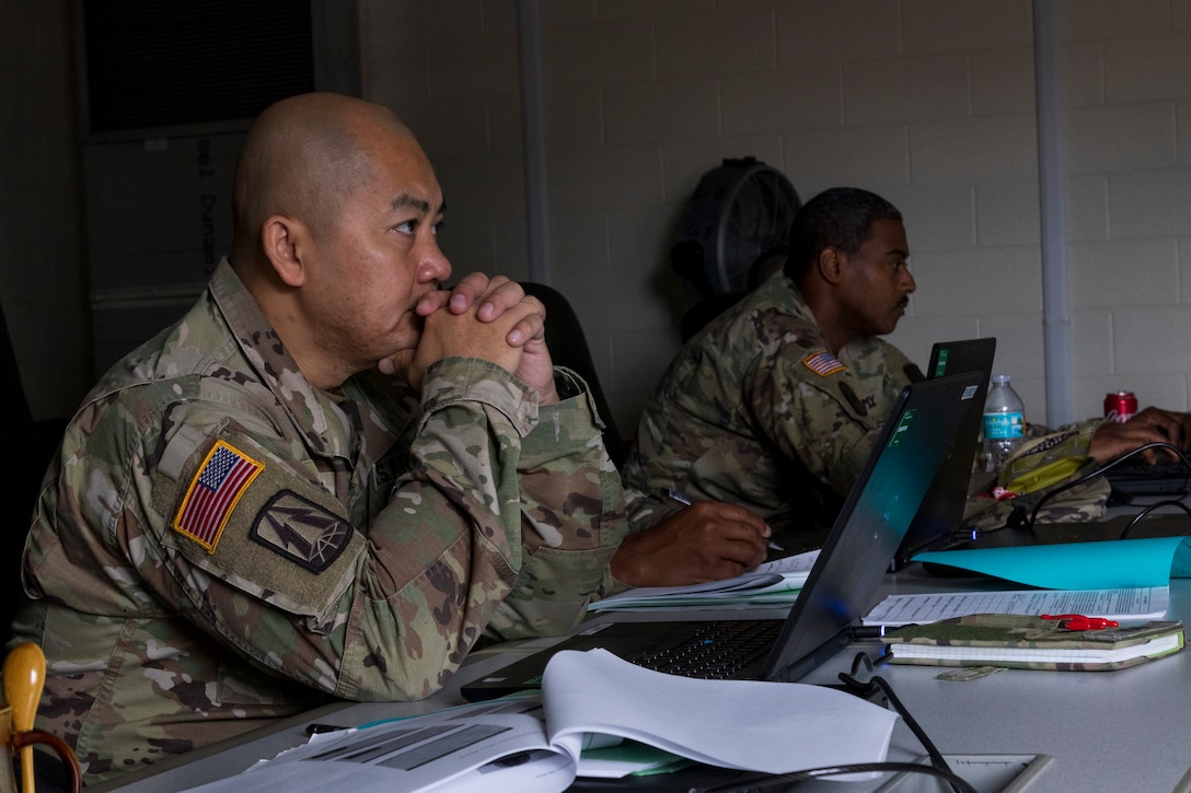 U.S. Army Reserve Soldiers with the 335th Signal Command (Theater) watch a video during a Casualty Notification and Assistance Course at the headquarters in East Point, Georgia, June 11, 2019.