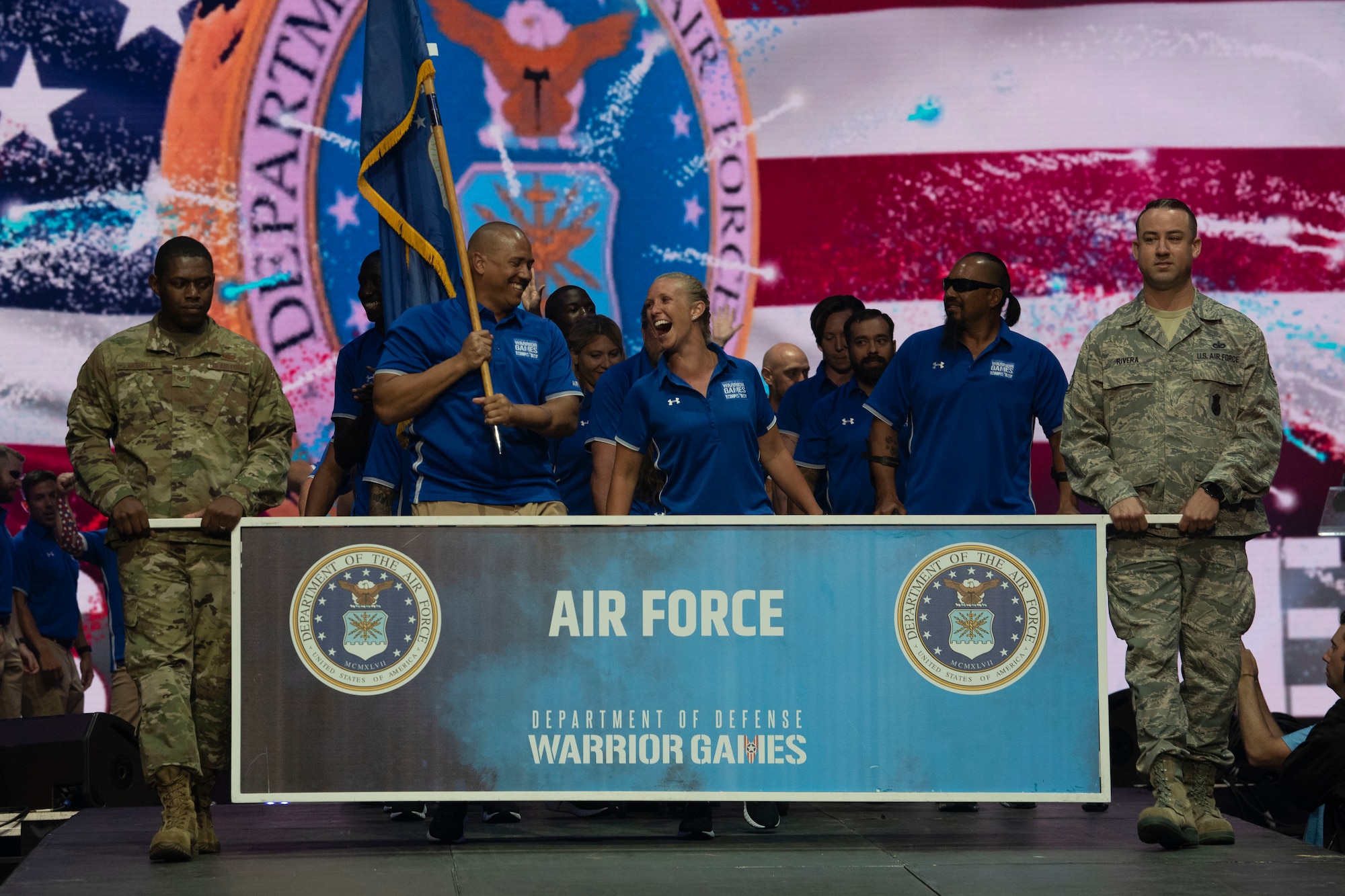 Air Force athletes enter the arena for the opening ceremony of the Department of Defense Warrior Games in Tampa Bay, Fla., June 22, 2019. (DoD photo by Lisa Ferdinando)