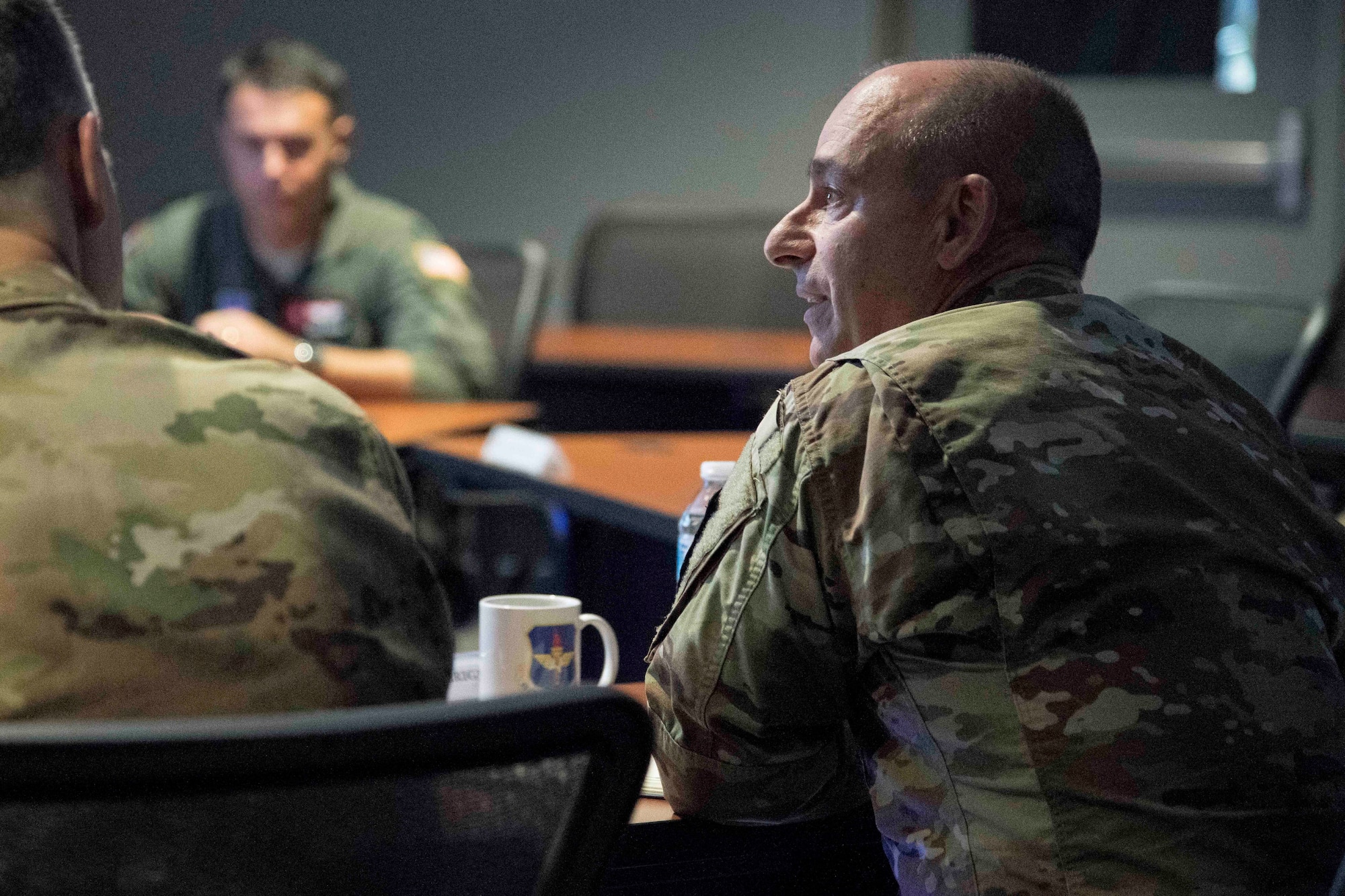 Gen. Jeffrey L. Harrigian, United States Air Forces Europe and United States Air Forces Africa commander, listens during a briefing on the training capabilities of Pilot Training Next during a visit to Detachment 24 at Joint Base San Antonio-Randolph, Texas, June 24, 2019.  PTN is an Air Education and Training Command program to explore and prototype a pilot training environment that integrates various technologies to produce pilots in a learning-focused manner. (U.S. Air Force photo by Sean M. Worrell)