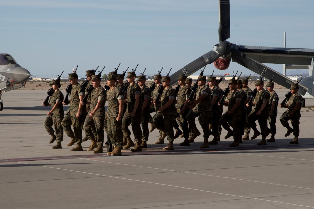 U.S. Marines with Marine Operational Test and Evaluation Squadron One participate in the battle color ceremony as part of the Relief and Appointment Ceremony at Marine Corps Air Station Yuma Ariz., June 6, 2019. The Relief and Appointment ceremony is an honored product of the rich heritage of Naval tradition. The heart of the ceremony is the passing of the NCO Sword by the Activity Commander from the outgoing Sergeant Major to the new Sergeant Major which signifies the transfer of responsibility, accountability, and authority, from one individual to another. (U.S. Marine Corps photo by Cpl. Joel Soriano)