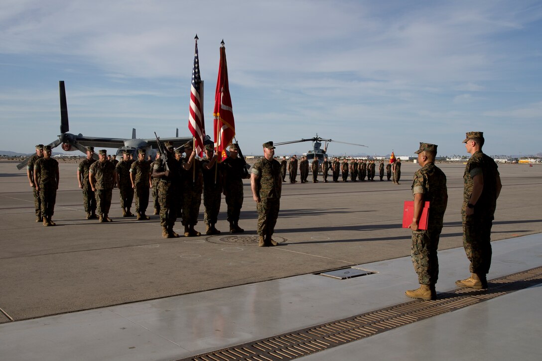 U.S. Marines with Marine Operational Test and Evaluation Squadron One participate in the Relief and Appointment Ceremony at Marine Corps Air Station Yuma Ariz., June 6, 2019. The Relief and Appointment ceremony is an honored product of the rich heritage of Naval tradition. The heart of the ceremony is the passing of the NCO Sword by the Activity Commander from the outgoing Sergeant Major to the new Sergeant Major which signifies the transfer of responsibility, accountability, and authority, from one individual to another. (U.S. Marine Corps photo by Cpl. Joel Soriano)