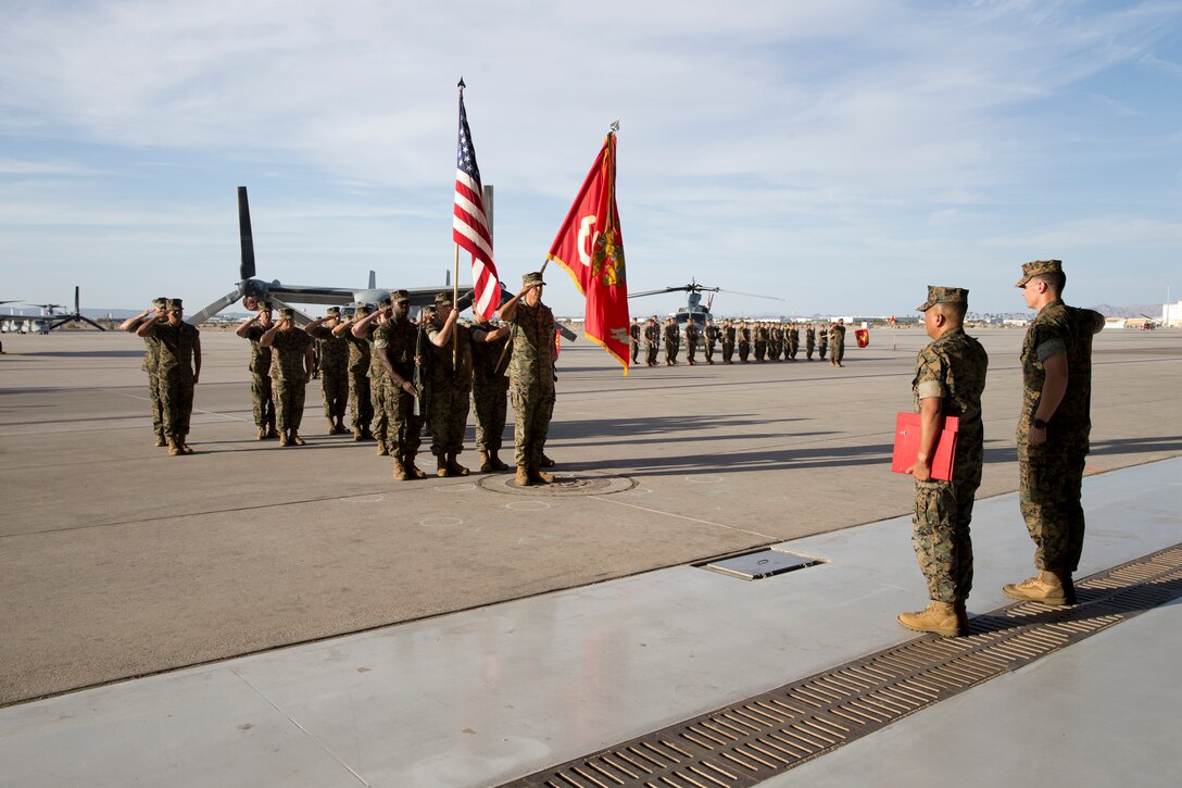 U.S. Marines with Marine Operational Test and Evaluation Squadron One participate in the Relief and Appointment Ceremony at Marine Corps Air Station Yuma Ariz., June 6, 2019. The Relief and Appointment ceremony is an honored product of the rich heritage of Naval tradition. The heart of the ceremony is the passing of the NCO Sword by the Activity Commander from the outgoing Sergeant Major to the new Sergeant Major which signifies the transfer of responsibility, accountability, and authority, from one individual to another. (U.S. Marine Corps photo by Cpl. Joel Soriano)