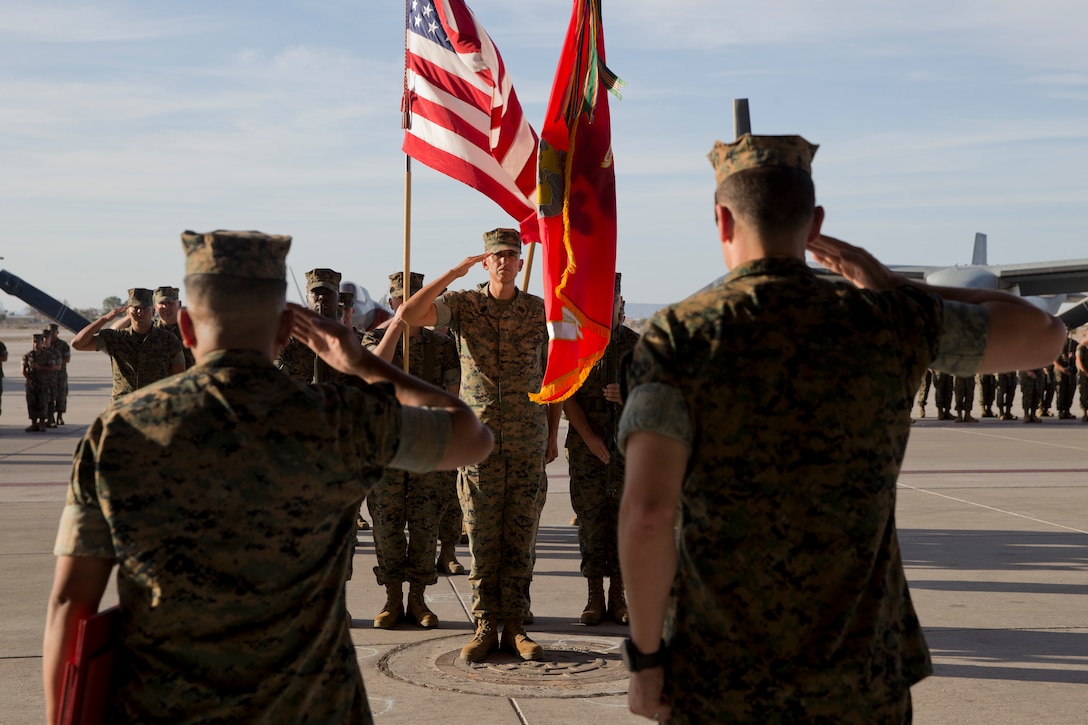 U.S. Marine Corps Sgt.Maj. Brian D. Olea, the outgoing Sergeant Major, salutes for the National Anthem during the Marine Operational Test and Evaluation Squadron (VMX) one Relief and Appointment Ceremony at Marine Corps Air Station Yuma Ariz., June 6, 2019. Sgt.Maj. Olea served with VMX-1 honorably for three years, ensuring that Marines assigned to the squadron performed their duties while continuously building unit morale.  (U.S. Marine Corps photo by Cpl. Joel Soriano)