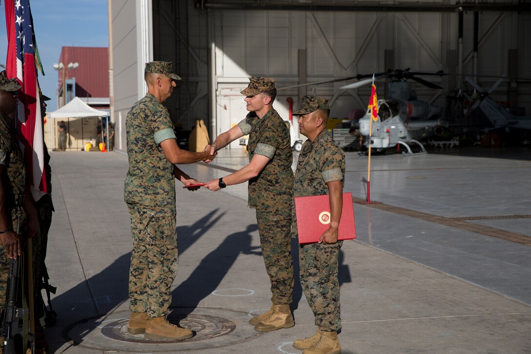U.S. Marine Corps Sgt.Maj. Brian D. Olea, the outgoing Sergeant Major, receives an award during the Marine Operational Test and Evaluation Squadron (VMX) one Relief and Appointment Ceremony at Marine Corps Air Station Yuma Ariz., June 6, 2019. Sgt.Maj. Olea served with VMX-1 honorably for three years, ensuring that Marines assigned to the squadron performed their duties while continuously building unit morale.  (U.S. Marine Corps photo by Cpl. Joel Soriano)