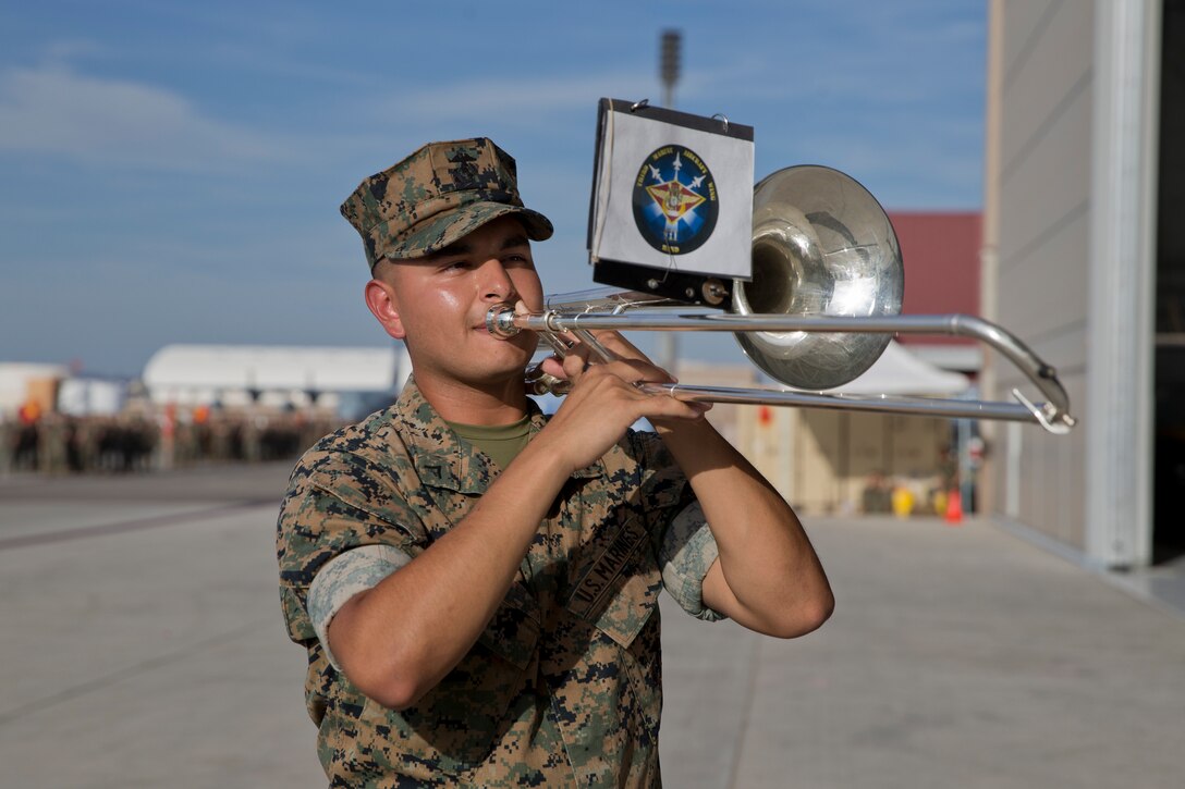 U.S. Marines with the 3rd Marine Aircraft Wing Band perform during SgtMaj. Brian D. Olea’s Relief and Appointment ceremony at Marine Corps Air Station Yuma Ariz., June 6, 2019. The Relief and Appointment ceremony is an honored product of the rich heritage of Naval tradition. The heart of the ceremony is the passing of the NCO Sword by the Activity Commander from the outgoing Sergeant Major to the new Sergeant Major which signifies the transfer of responsibility, accountability, and authority, from one individual to another. (U.S. Marine Corps photo by Cpl. Joel Soriano)