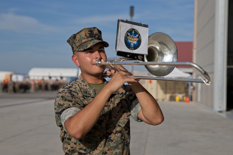 U.S. Marines with the 3rd Marine Aircraft Wing Band perform during SgtMaj. Brian D. Olea’s Relief and Appointment ceremony at Marine Corps Air Station Yuma Ariz., June 6, 2019. The Relief and Appointment ceremony is an honored product of the rich heritage of Naval tradition. The heart of the ceremony is the passing of the NCO Sword by the Activity Commander from the outgoing Sergeant Major to the new Sergeant Major which signifies the transfer of responsibility, accountability, and authority, from one individual to another. (U.S. Marine Corps photo by Cpl. Joel Soriano)