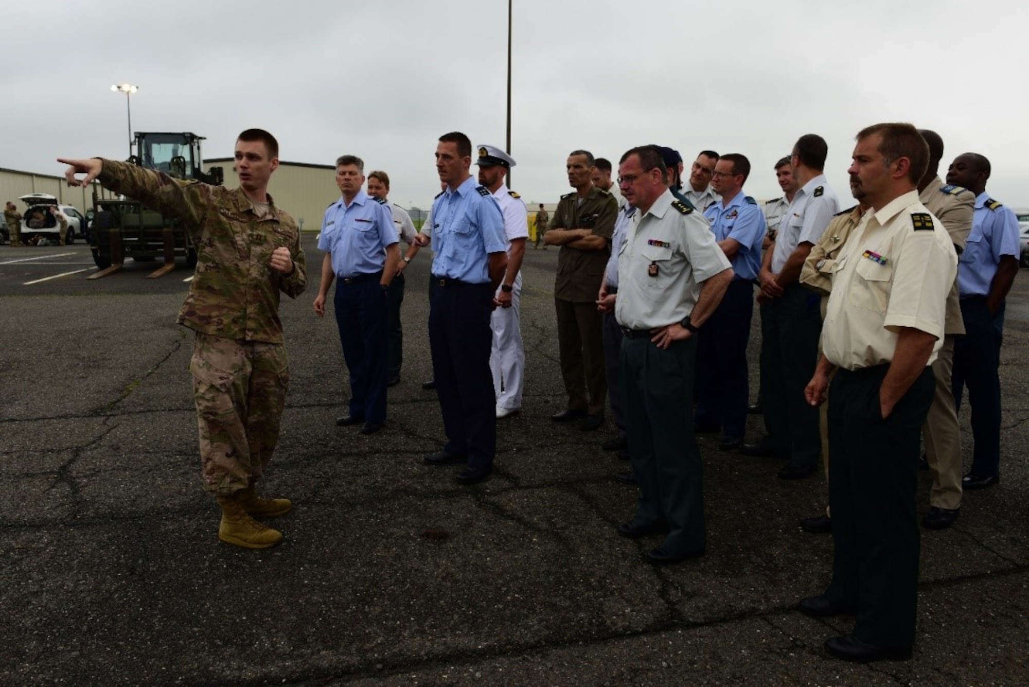 Belgium Royal Military Academy students get a tour of the Rapid Global Deployment Center at Joint Base McGuire-Dix-Lakehurst, New Jersey, June 20, 2019. The visit was to provide students with a look into operations on the Joint Base. (U.S. Air Force photo by Airman 1st Class Shay Stuart)