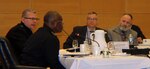 Defense Logistics Agency Director Army Lt. Gen. Darrell Williams, second from left, listens as DLA Troop Support Commander Brig. Gen. Mark Simerly, left, provides status updates on items in Troop Support’s operational objectives at an agency review June 14, 2019 in Philadelphia.