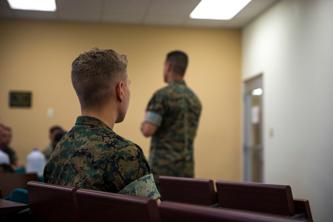 U.S. Marine Corps Lt.Col. James C. Paxton and Sgt.Maj. Fabian Casillas the commanding officer and sergeant major of Marine Corps Air Station (MCAS) Yuma's Headquarters & Headquarters Squadron (H&HS) welcome the new Marines and Sailors assigned to H&HS during a Welcome Aboard brief at MCAS Yuma, Ariz., June 12, 2019. The H&HS "Guardians" are responsible for all day-to- day operations on the air station, with approximately 800 Marines and Sailors are assigned to the Squadron, as well as around 1,200 civilians who work on the air station. (U.S. Marine Corps photo by Lance Cpl. John Hall)