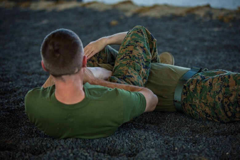 U.S. Marines stationed at Marine Corps Air Station (MCAS) Yuma, practice Marine Corps Martial Arts Program (MCMAP) techniques at MCAS Yuma, Ariz., June 18, 2019. MCMAP is a combat system developed by the United Stated Marine Corps to combine martial arts techniques with morale and team-building functions and instructions in the warrior ethos that Marines should embody. (U.S. Marine Corps photo by Lance Cpl. Hall)