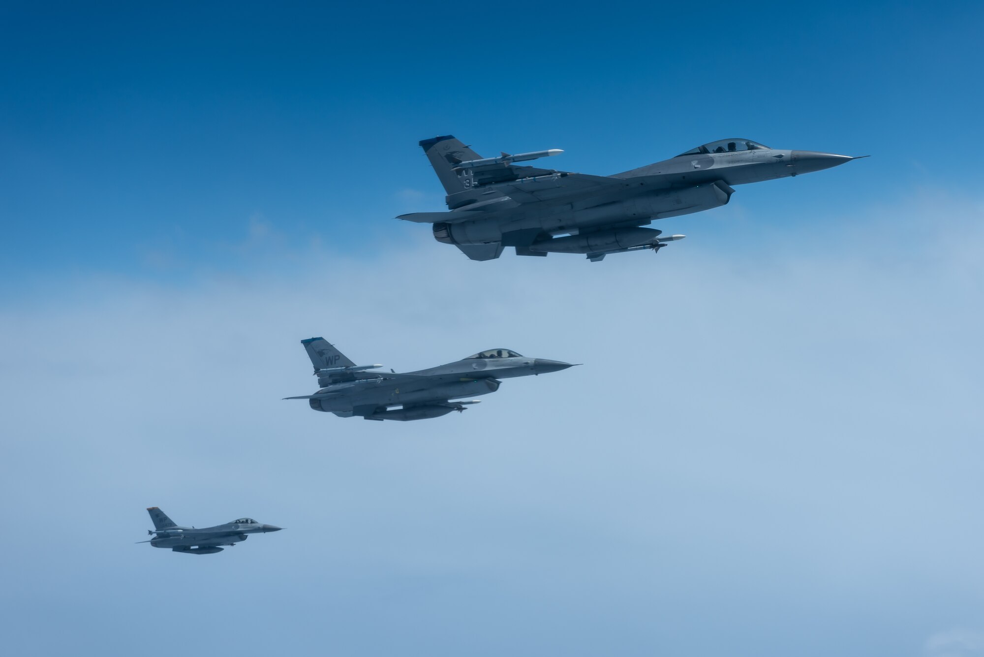 Three F-16 Fighting Falcons from the 8th Fighter Wing, Kunsan Air Base, Republic of Korea, fly a training exercise June 18, 2019. The 8th FW provides worldwide deployable forces with a sustained forward presence focused on maintaining a free-and-open Indo-Pacific. (U.S. Air Force photo by Airman 1st Class Matthew Seefeldt)