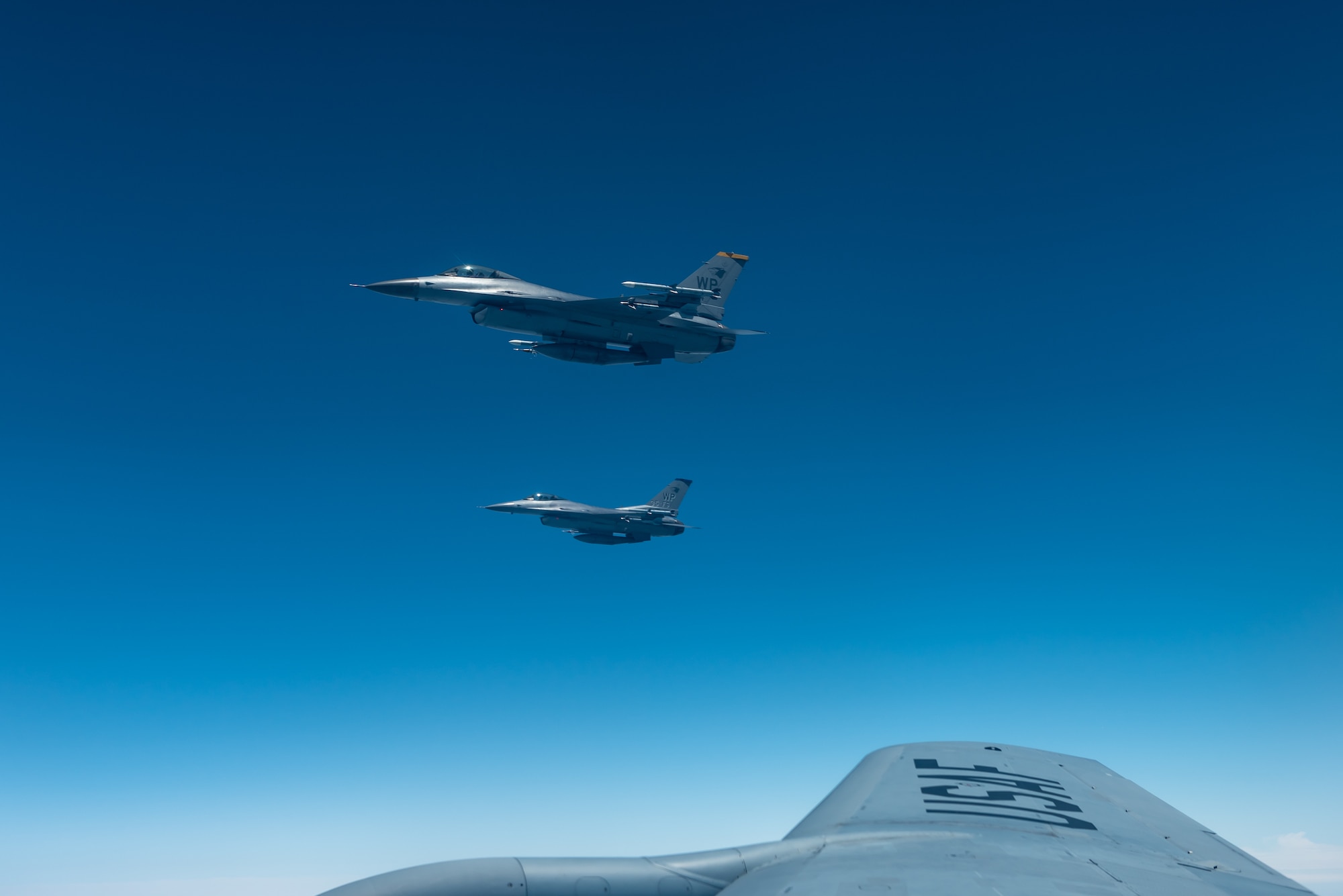 Two F-16 Fighting Falcons from the 8th Fighter Wing, Kunsan Air Base, Republic of Korea, fly during a training exercise June 18, 2019. The 8th FW provides worldwide deployable forces with a sustained forward presence focused on maintaining a free-and-open Indo-Pacific. (U.S. Air Force photo by Airman 1st Class Matthew Seefeldt)
