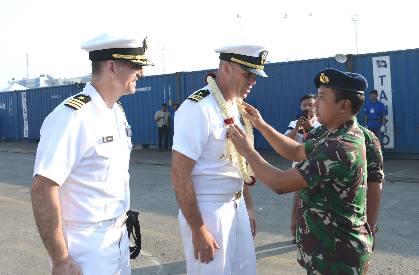 JAKARTA, Indonesia (June 25, 2019) Indonesian Navy officers greet USS Patriot (MCM 7) leadership during an arrival ceremony in Jakarta, Indonesia. Patriot, part of Mine Countermeasures Squadron 7, is operating in the U.S. 7th Fleet area of operations to enhance interoperability with partners and serve as a ready-response platform for contingency operations.