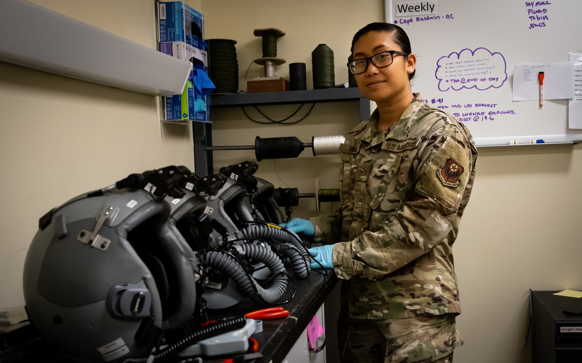 Airman 1st Class Samira Trimas, Aircrew Flight Equipment technician assigned to the 353rd Special Operations Support Squadron, poses for a photo on Kadena Air Base, June 25, 2019.