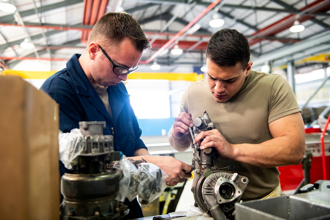 Aerospace technicians, assigned to the 4th Component Maintenance Squadron, Seymour Johnson Air Force Base, North Carolina, perform maintenance on aircraft parts while deployed to the 48th CMS Propulsion Flight at Royal Air Force Lakenheath, England, June 20, 2019. The 48th CMS manages three Centralized Repair Facilities to support U.S. Africa Command, Central Command, European Command, NATO and U.S. Air Force in Europe - Air Forces Africa taskings by performing equipment calibrations and intermediate level maintenance on F-15C Eagles, F-15D Eagles, F-15E Strike Eagles as well as several other airframes. (U.S. Air Force photo by Senior Airman Malcolm Mayfield)