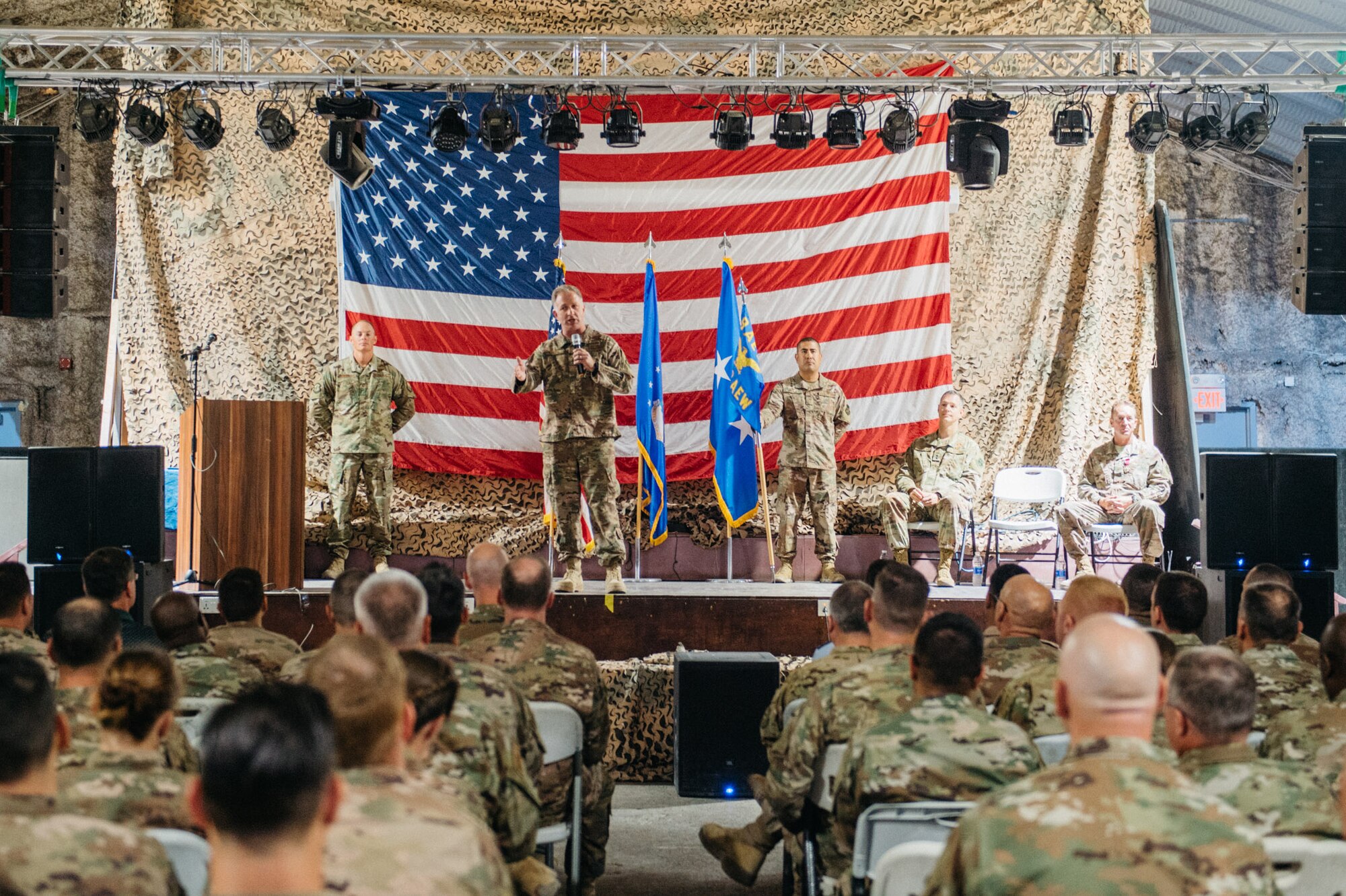 Brig. Gen. Mark Slocum addresses members of the 332nd Air Expeditionary Wing for the first time during a change of command ceremony in Southwest Asia, June 20, 2019.