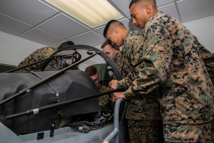 Students at the Center for Naval Aviation Technical Training learn about various instruments in an AV-8B Harrier trainer at Marine Corps Air Station Cherry Point, N.C.. CNATT trains an average of 2,000 Marines annually to repair and maintain aircraft in the Marine Corps. In addition to attending classes, the Marines who are waiting to start class can also be found honing their skills in the Marine Corps Martial Arts Program or volunteering in the local community. (U.S. Marine Corps photo by Cpl. Andrew King)