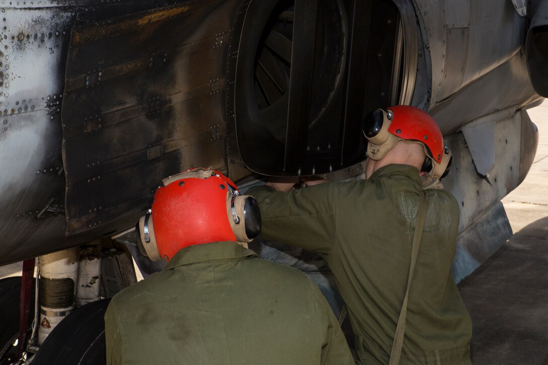 Center for Naval Aviation Technical Training students learn how to attach ordnance to a AV-8B Harrier trainer as part of a hands-on class at Marine Corps Air Station Cherry Point, N.C., March 4, 2019. MCAS Cherry Point CNATT trains an average of 2,000 Marines and Sailors yearly through organizational to intermediate level classes, in their respective Military Occupational Specialties. (U.S. Marine Corps photo by Cpl. Andrew King)
