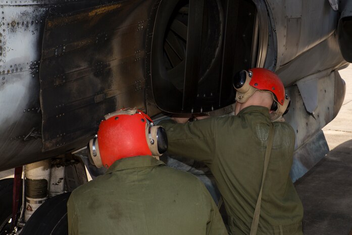 Center for Naval Aviation Technical Training students learn how to attach ordnance to a AV-8B Harrier trainer as part of a hands-on class at Marine Corps Air Station Cherry Point, N.C., March 4, 2019. MCAS Cherry Point CNATT trains an average of 2,000 Marines and Sailors yearly through organizational to intermediate level classes, in their respective Military Occupational Specialties. (U.S. Marine Corps photo by Cpl. Andrew King)