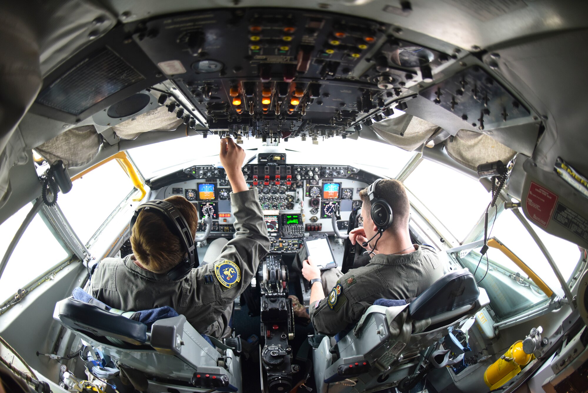 U.S. Air Force Maj. Patrick Hanson and Capt. Brendan Keiper, 351st Air Refueling Squadron pilots,perform a preflight checklist before a training mission supporting Exercise Baltic Operations at RAF Mildenhall, England, June 19, 2019. BALTOPS is an exercise involving approximately 11,600 maritime, ground and air force personnel from 18 countries. (U.S. Air Force photo by Airman 1st Class Joseph Barron)