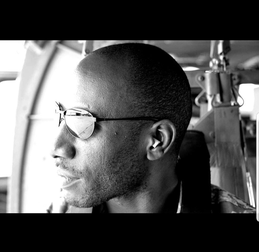 U.S. Air Force Senior Airman Patrick Sims, 28th Logistics Readiness Squadron vehicle maintainer, sits in a helicopter while deployed in Afghanistan, Nov. 15, 2010.