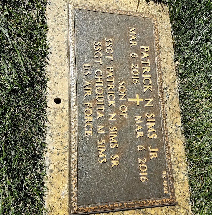 U.S. Air Force Staff Sgt. Patrick Sims, 87th Logistics Readiness Squadron vehicle maintainer, son’s grave stone lies at Brig. Gen. William C. Doyle Memorial Cemetery, March 6, 2016.