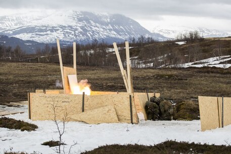 U.S. Marines with 8th Engineer Support Battalion, 2nd Marine Logistics Group, and a Norwegian soldier breach a door during an urban-breaching range in Skjold Leir, Norway, May 29, 2019. The Marines of 8th ESB deployed to Norway to participate in exercise Thunder Reindeer 19, a multilateral, combined-arms, live-fire exercise between the Norwegian Armed Forces and U.S. Marine Corps. Training conducted during the deployment increases interoperability with Norwegian allies, and improves the Marine Corps’ cold-weather and mountain-warfare proficiencies. (U.S. Marine Corps photo by Lance Cpl. Larisa Chavez