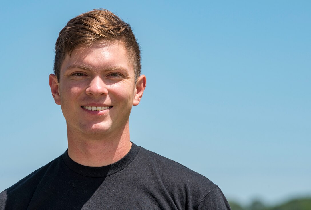 U.S. Air Force Airman 1st Class Kalen Norwood, 633rd Communications Squadron cable and antenna systems technician, poses for a photo at Joint Base Langley-Eustis, Virginia, June 11, 2019.