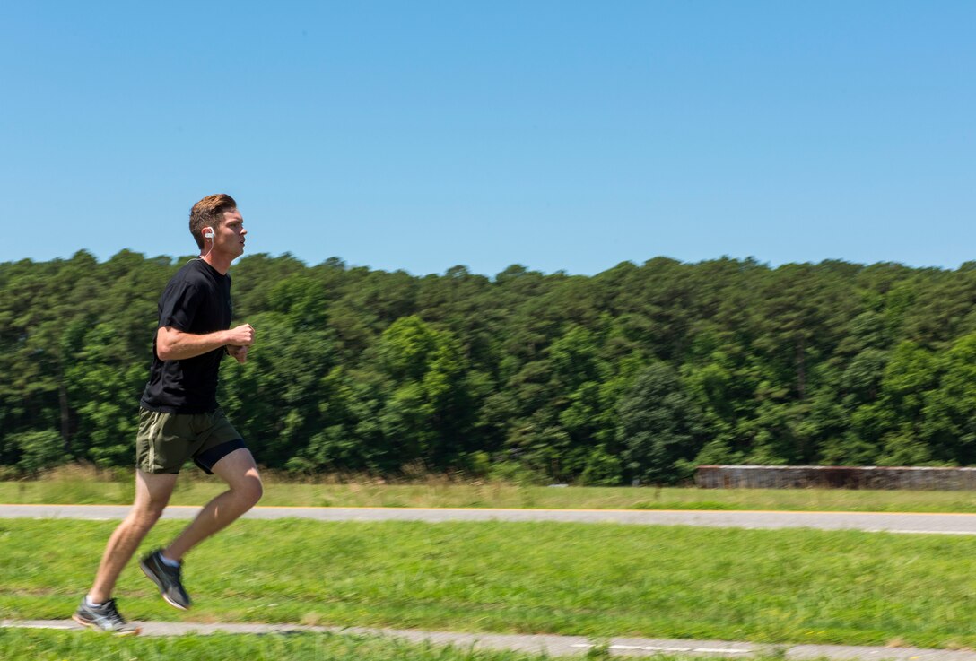 U.S. Air Force Airman 1st Class Kalen Norwood, 633rd Communications Squadron cable and antenna systems technician, runs at Joint Base Langley-Eustis, Virginia, June 11, 2019.