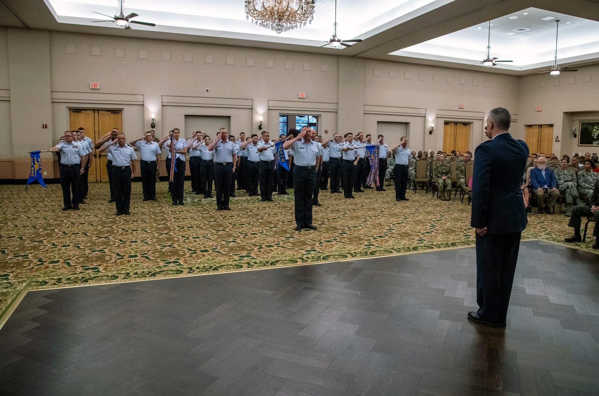 Col. Eric DeLange, 688th Cyberspace Wing commander, renders a “final salute” to 688th CW Airmen during the wing’s change of command ceremony at Joint Base San Antonio-Lackland, Texas, on June 25, 2019. Col. Steven Anderson took command of the 688th CW during the ceremony. (U.S. Air Force photo by Johnny Saldivar)