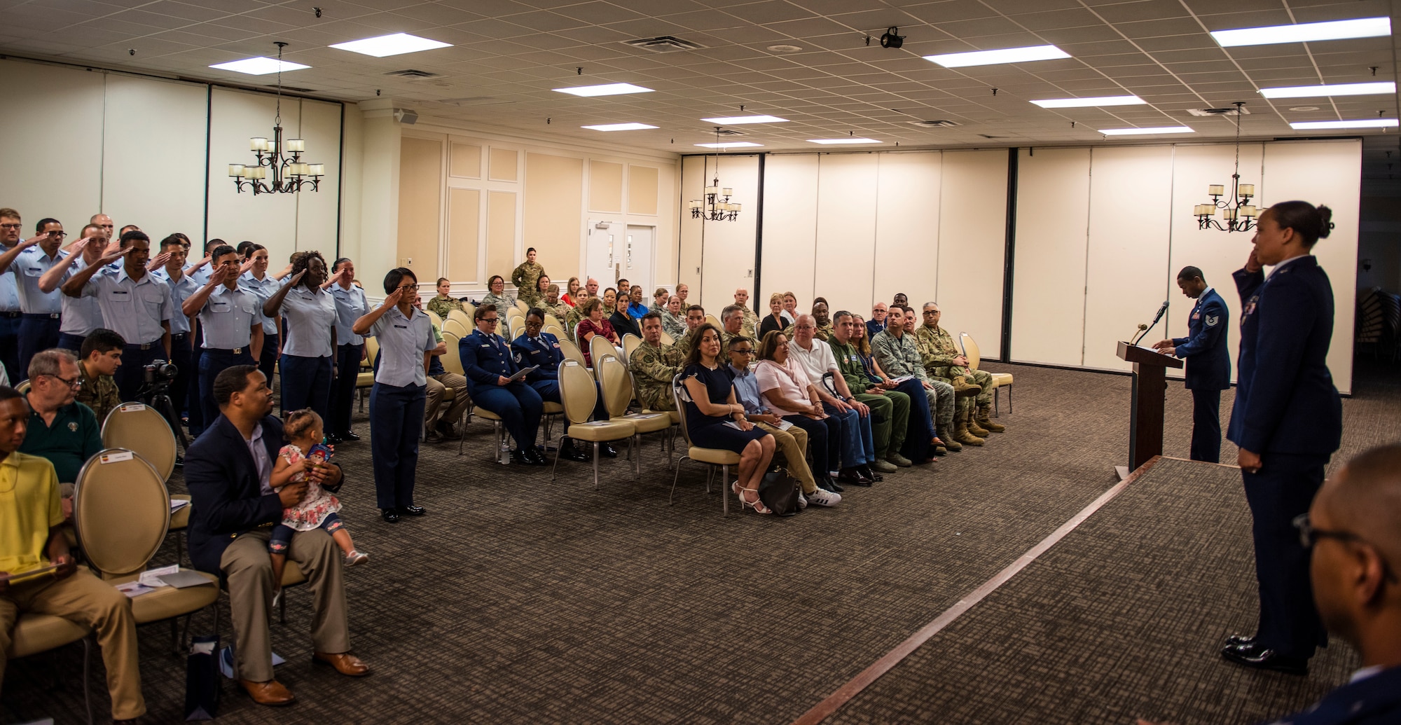 U.S. Air Force Lt. Col. Marquita Price, outgoing 20th Medical Operations Squadron commander, performs a last salute before relinquishing her command at Shaw Air Force Base, South Carolina, June 21, 2019.