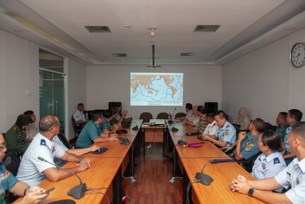 Hawaii National Guard medical personnel along with counterparts from the Indonesian Armed Forces, receive an intro brief during a visit to the Republic of Indonesia Center for Health Crisis Jun. 17, 2019, Jakarta, Indonesia.