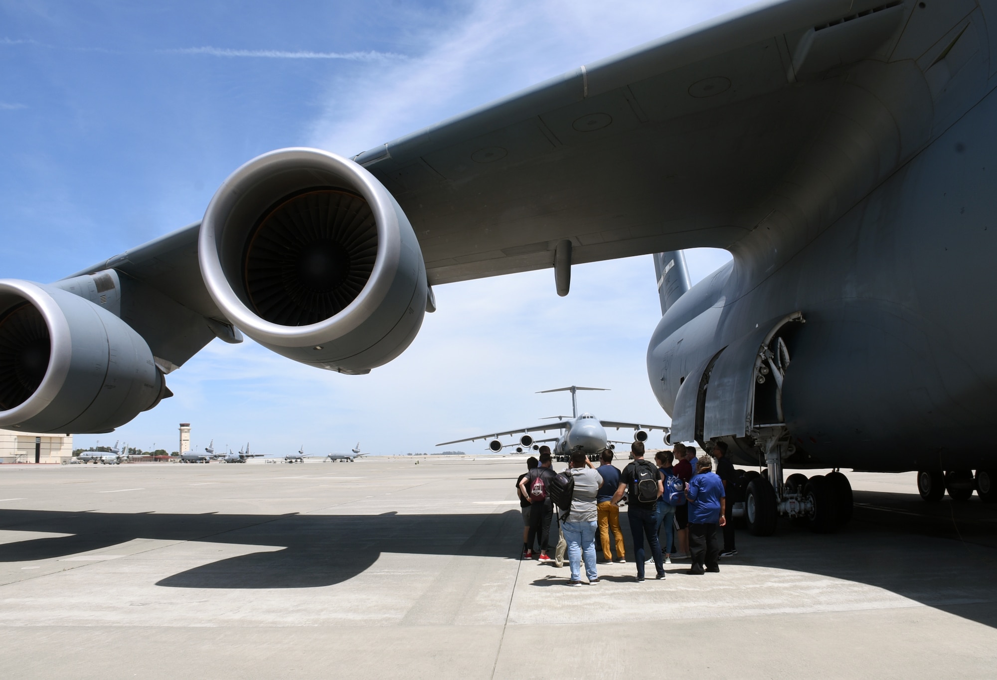 Team Travis Airmen and Sacramento Republic Football Club staff members tour a C-5M Super Galaxy June 24, 2019, at Travis Air Force Base, California. The staff members played a pick-up soccer match with Airmen and learned about the Travis AFB mission ahead of their “Salute to Service Night.” (U.S. Air Force photo by Senior Airman Christian Conrad)