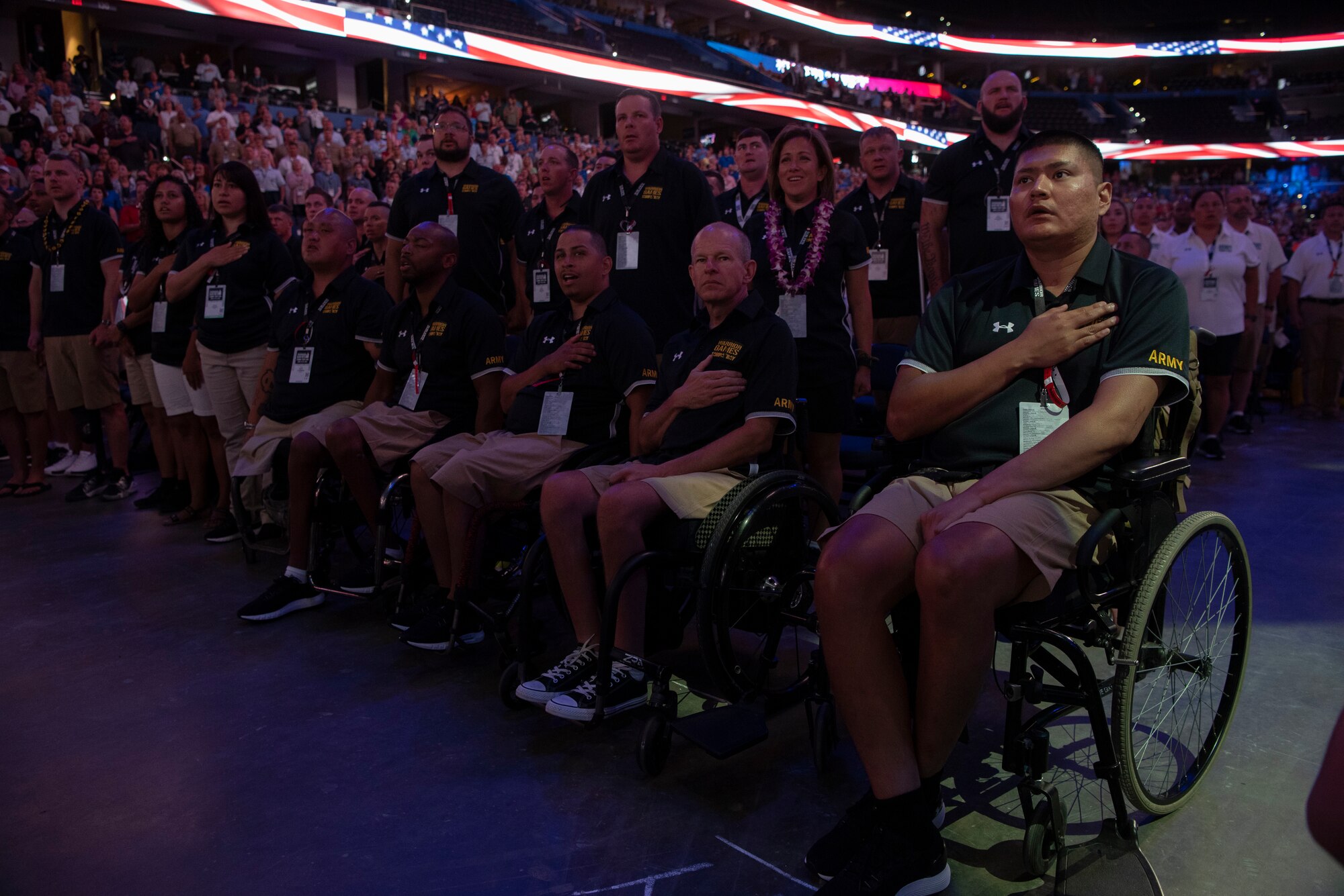 Army athletes render honors at the opening ceremony of the Department of Defense Warrior Games, Tampa, Florida, June 22, 2019. (DoD photo by Lisa Ferdinando)