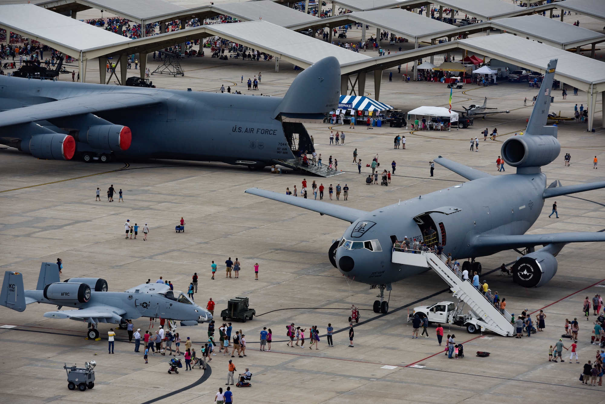 U.S. Air Force C-5 Galaxy, KC-10 Extender and A-10 Thunderbolt II aircraft static displays stand on the flightline at Whiteman Air Force Base, Mo.,  June 16, 2019.  Various military and civilian aircraft were on display to the public during the two-day Wings O ver Whiteman Air and Space Airshow.