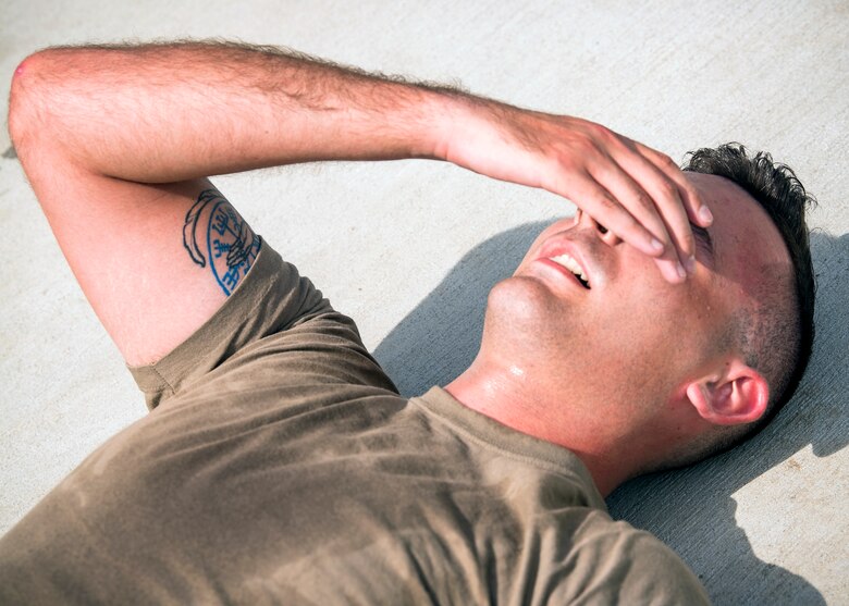 Senior Airman Gavin Rees, 23d Logistics Readiness Squadron (LRS) fuels facilities technician, lays on the ground following Forward Area Refueling Point (FARP) tryouts, June 21, 2019, at Moody Air Force Base, Ga. Eleven Airmen from the 23d LRS Petroleum, Oils and Lubricants flight were judged and evaluated on their ability to carry various fueling equipment to and from checkpoints as quickly as possible. The FARP team’s mission requires for them to carry heavy fueling equipment to and from aircraft in a quick manner, so the tryouts were designed to gauge Airmen’s physical readiness to complete their mission. Following the tryouts the Airmen were interviewed to further evaluate their mental readiness to join the FARP team and ultimately one Airman will be chosen. (U.S. Air Force photo by Airman 1st Class Eugene Oliver)
